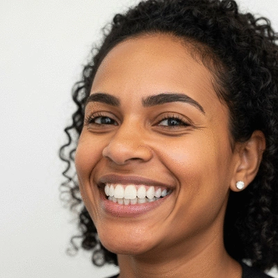 Close-up of a patient smiling, showcasing perfect dental implants and crowns after a successful full mouth reconstruction, bright clinic background, no text, no words, no typography, clean image
